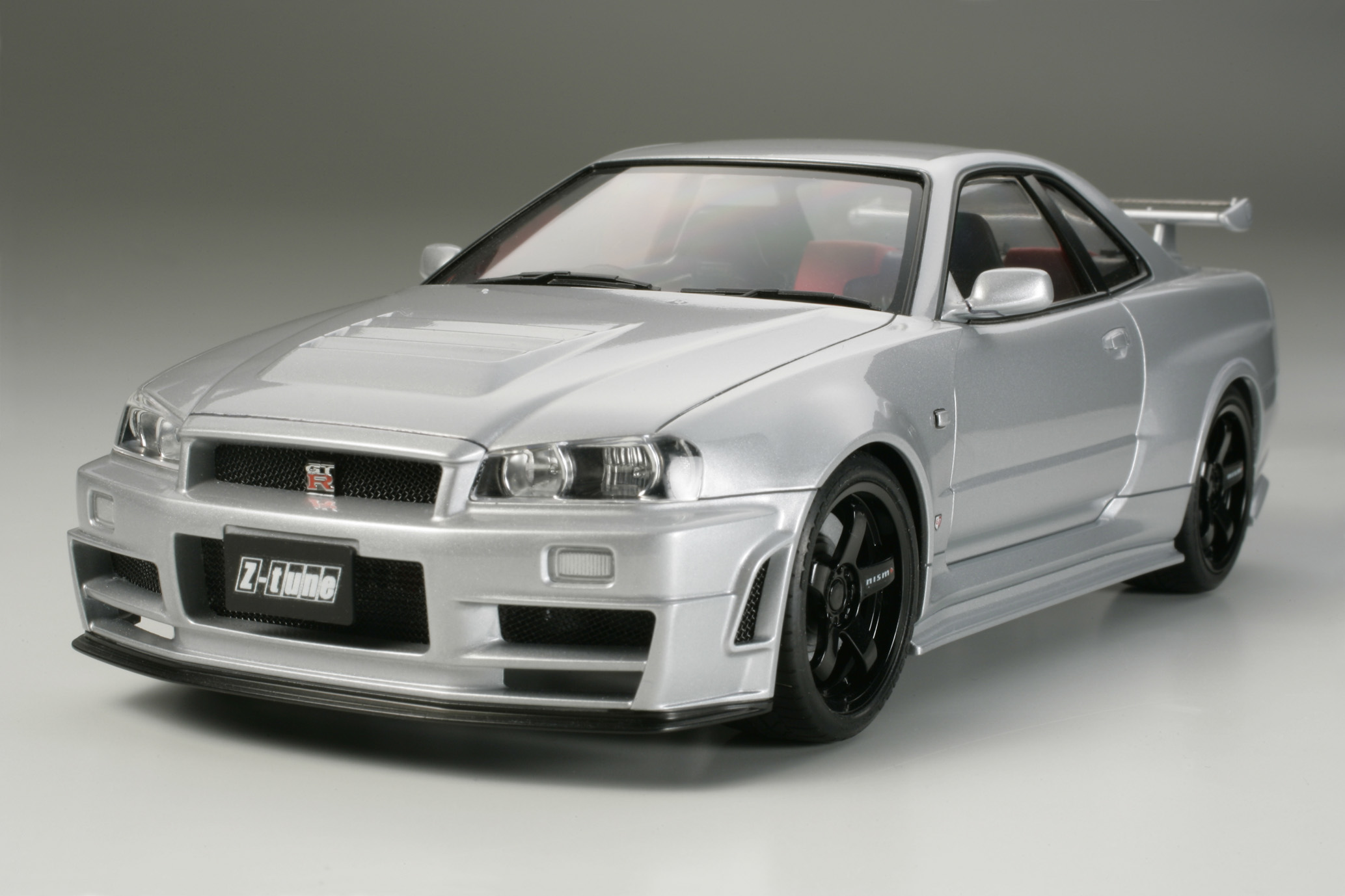 Модель skyline r34. Nissan Nismo r34 gt-r z-Tune. Tamiya Nissan Skyline gt-r. Nissan Skyline GTR r34 z Tune Tamiya. Nismo r34 gt-r z-Tune Tamiya.